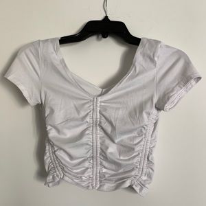 White cropped shirt.